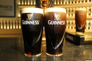 Two glasses of perfectly pour Guinness
