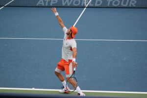 Feliciano Lopez serves at Dubai Tennis Opne