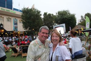 In front of the big screen on the lawn at the Dubai Tennis Tournament