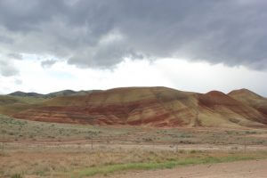 Photo of a Painted Hill in stripes of red, yellow, tan