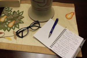 Nightstand with journal and light-up pen