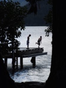 Kids on a pier at Lake Crescent