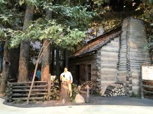 Young Lincoln and cabin