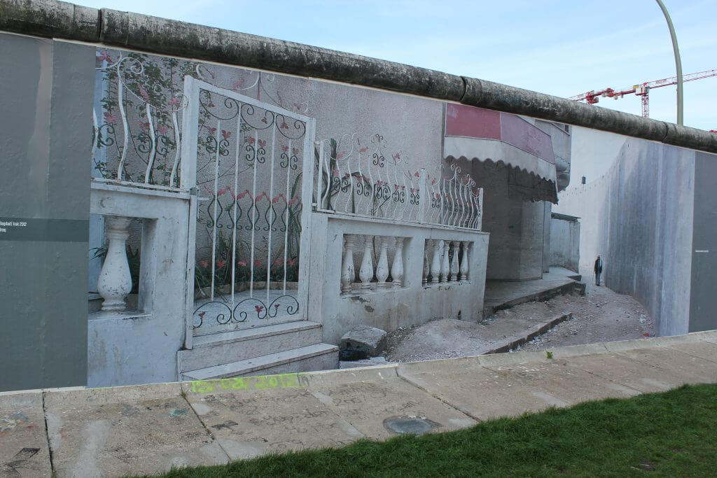 Village scene painted on Berlin Wall.