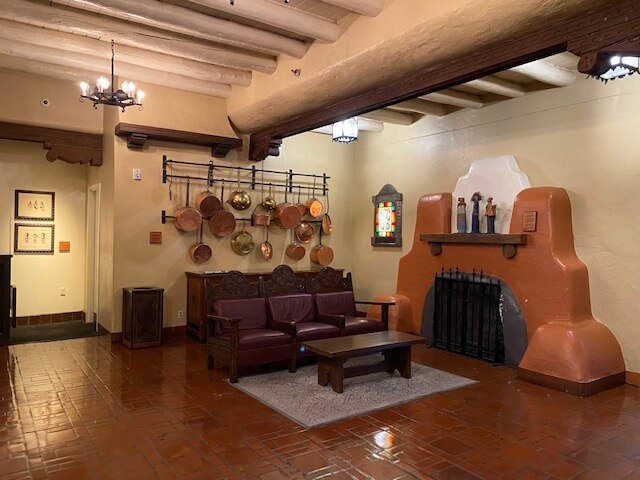 One of many lobby adobe fireplaces